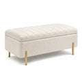 Banc de rangement en boucle beige avec pieds en métal doré